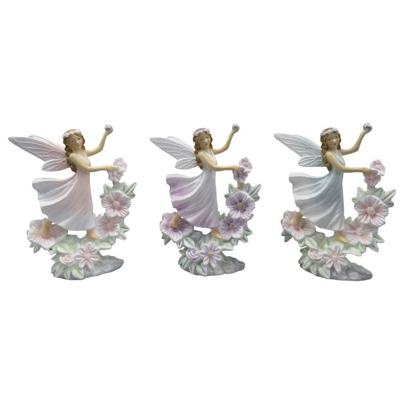 Fairy on Flowers Holding Ball - Dollars and Sense