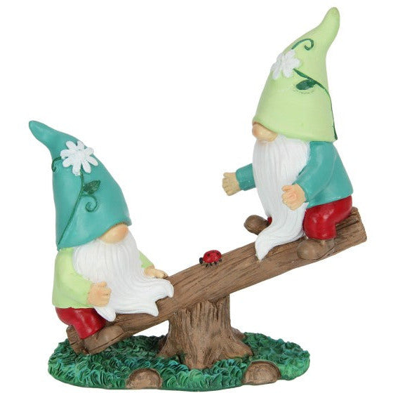 Playful Gnomes on Seesaw - Dollars and Sense